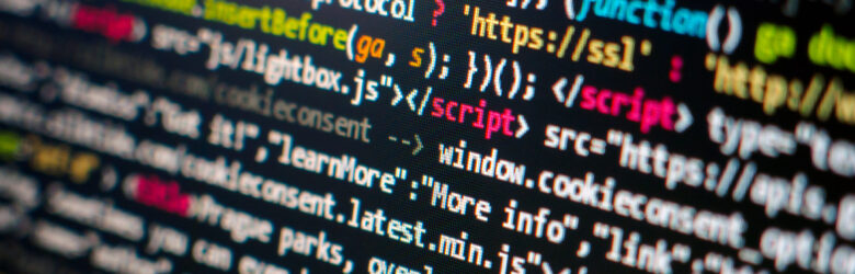 Computer screen showing programming code, representing software dependencies and supply chain security