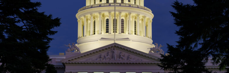The California State Capitol building in Sacramento illuminated during blue hour