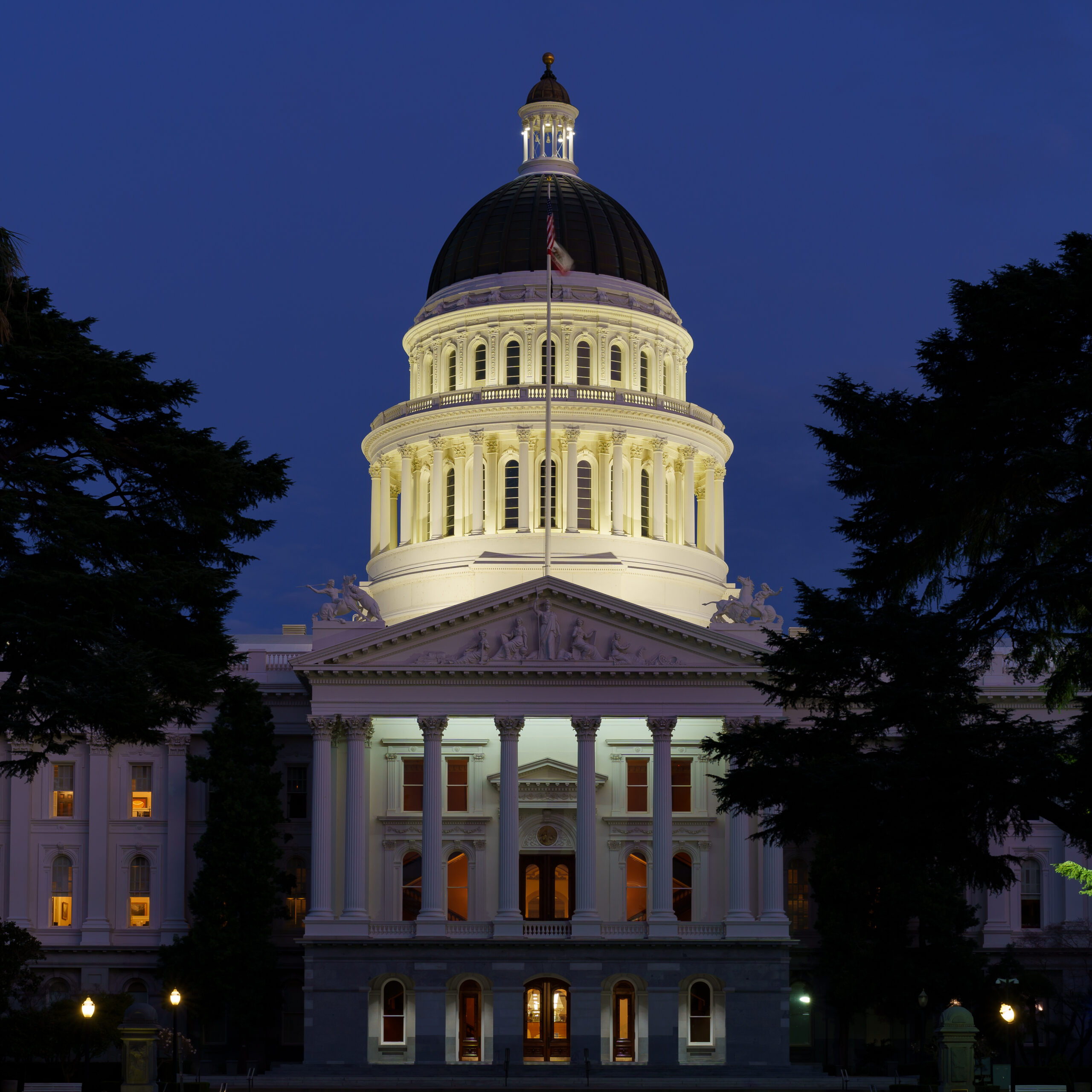 The California State Capitol building in Sacramento illuminated during blue hour