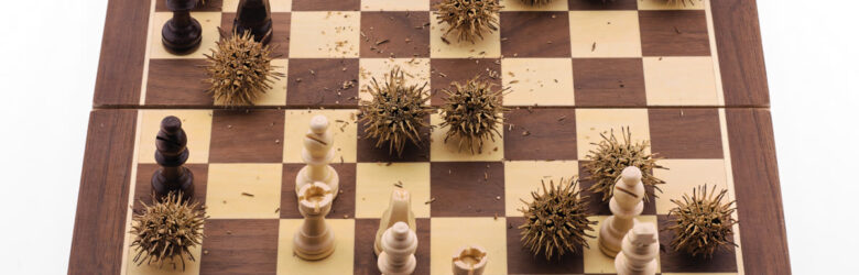 Chess pieces arranged on a battlefield-style board representing the strategic competition for AI talent