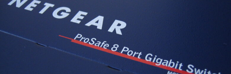 Close-up of a Netgear Prosafe GS108 Gigabit Ethernet switch with connected cables