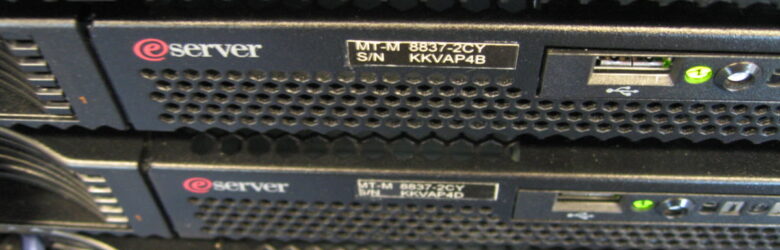 Close-up of an IBM eServer rack showing enterprise server hardware and networking equipment