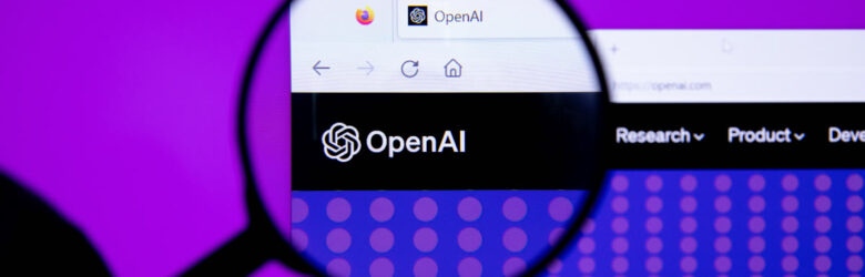OpenAI logo viewed through a magnifying glass representing security scrutiny