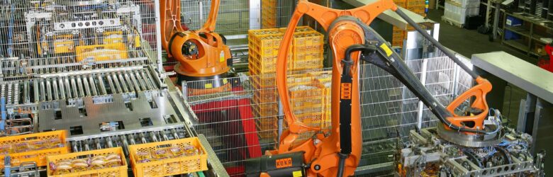 Industrial robotic arm palletizing items in factory automation