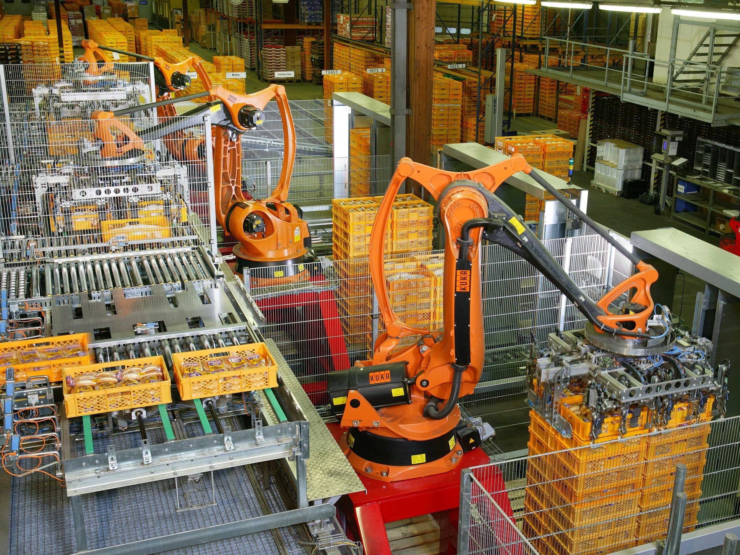 Industrial robotic arm palletizing items in factory automation