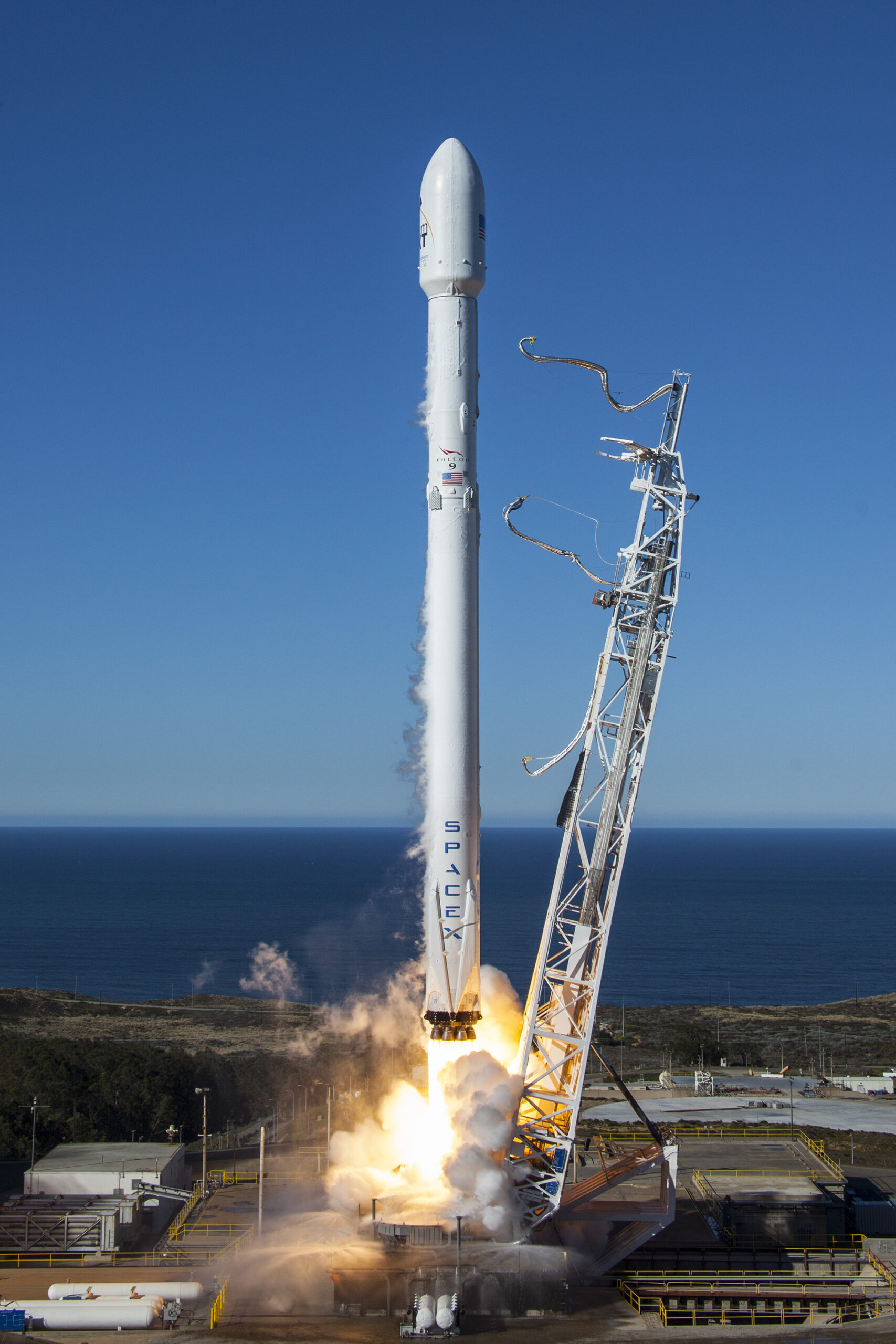 SpaceX Falcon 9 rocket lifting off from Vandenberg Air Force Base during the Iridium-1 mission