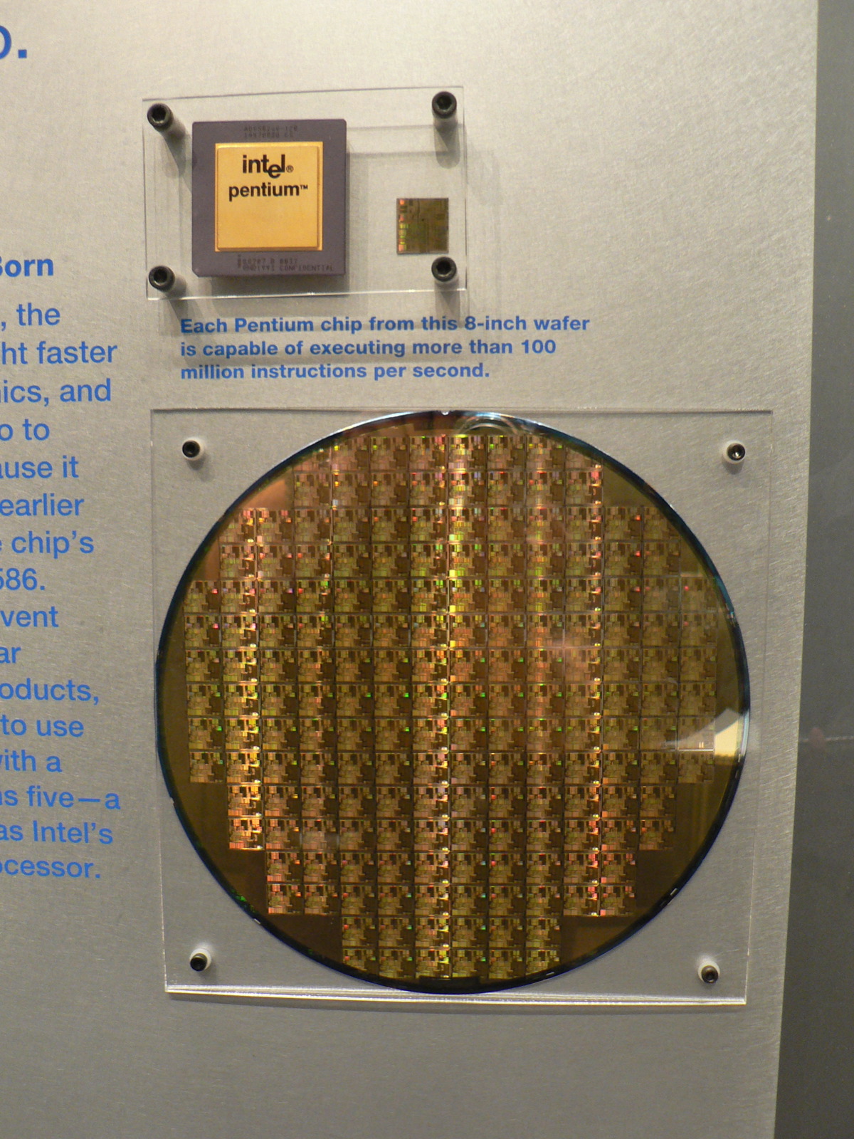 Silicon wafer with microchips representing the compute costs behind AI services