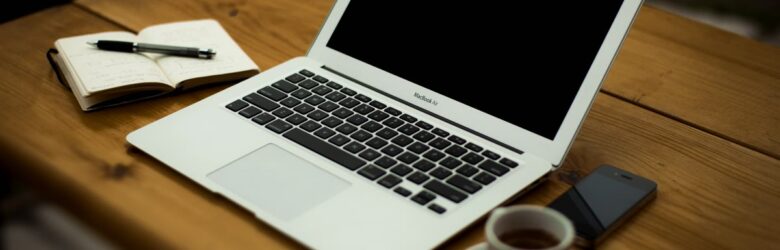 A home office desk with a laptop representing independent web publishing and the IndieWeb movement