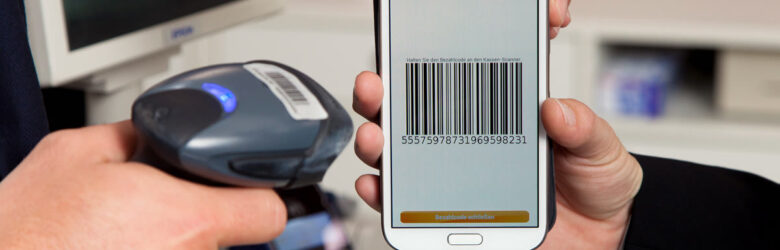 Person holding smartphone showing a mobile payment transaction screen