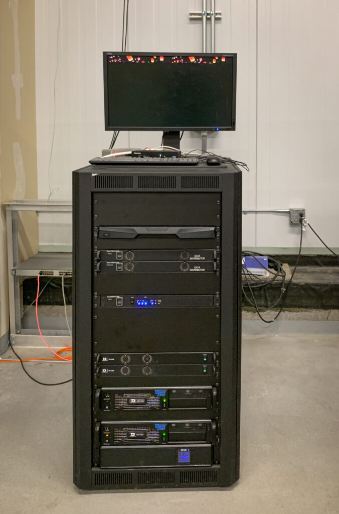 Server rack in a data center with networking equipment