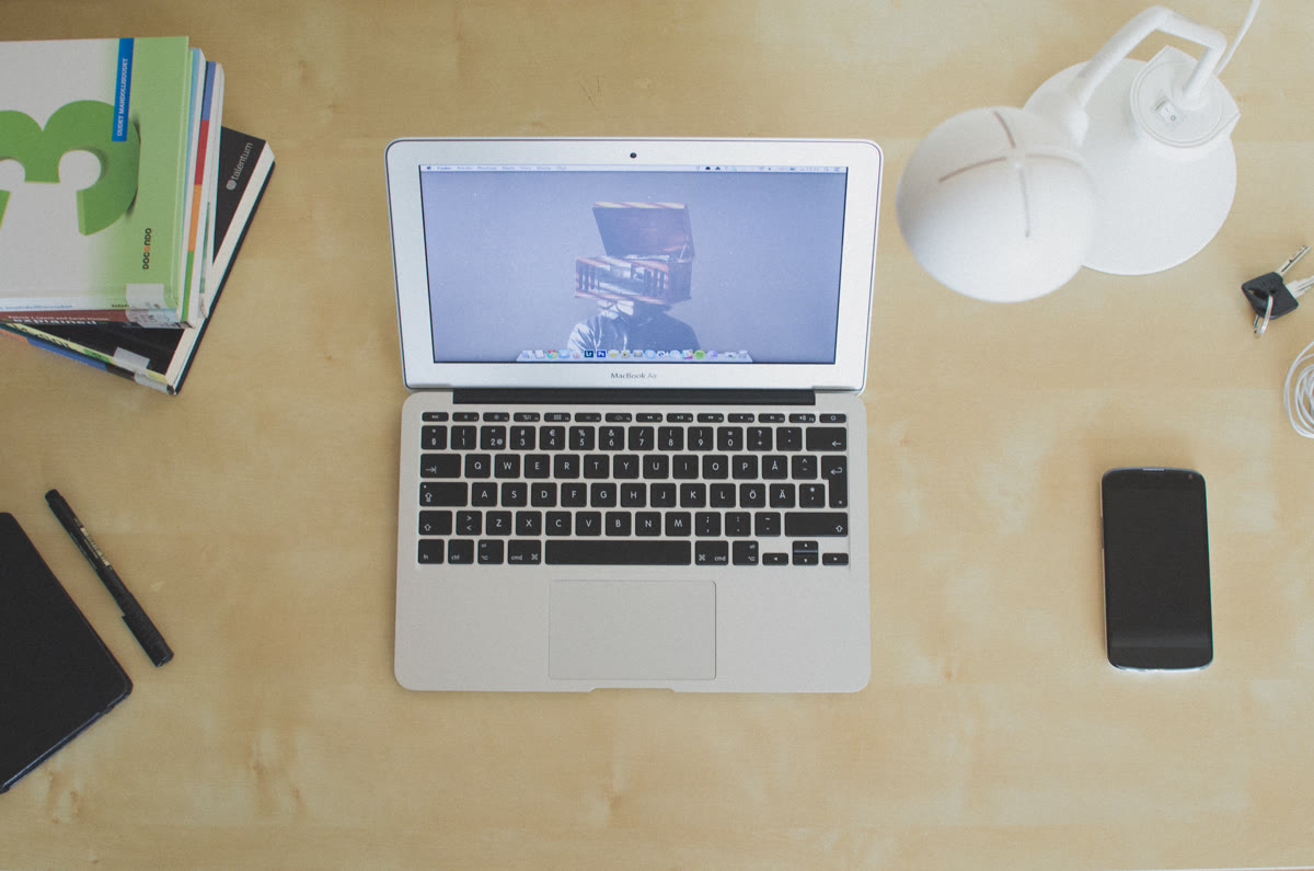 Laptop on a desk workspace representing a developer environment