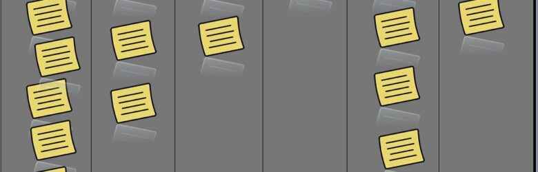 Physical kanban board with sticky notes tracking workflow tasks