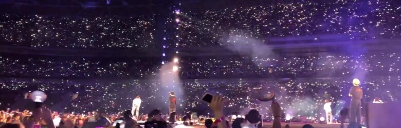 BTS performing on stage at Wembley Stadium in 2019 during the Love Yourself Speak Yourself tour