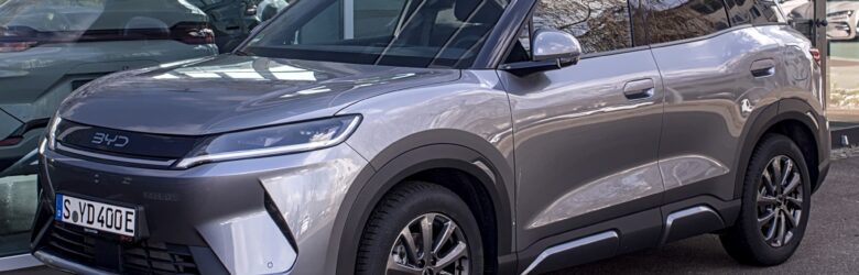 BYD Atto 2 DM-i plug-in hybrid crossover shown at an auto event