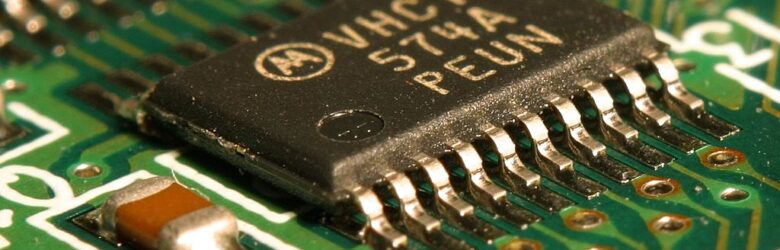 Close-up of an integrated circuit microchip for AI inference hardware