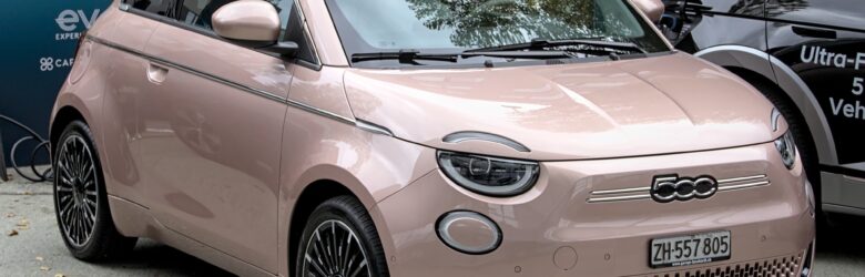 Fiat 500e compact electric city hatchback at an auto show