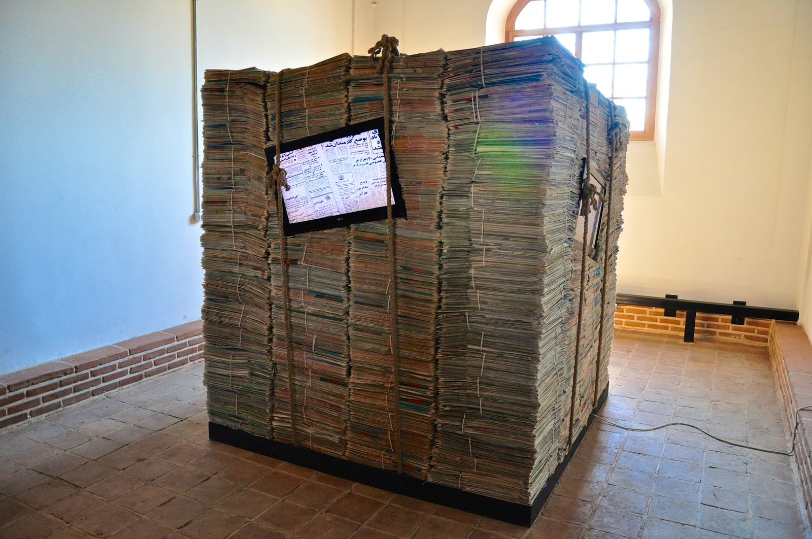 Stack of printed newspapers, representing the publishers whose web traffic is being reduced by AI search features