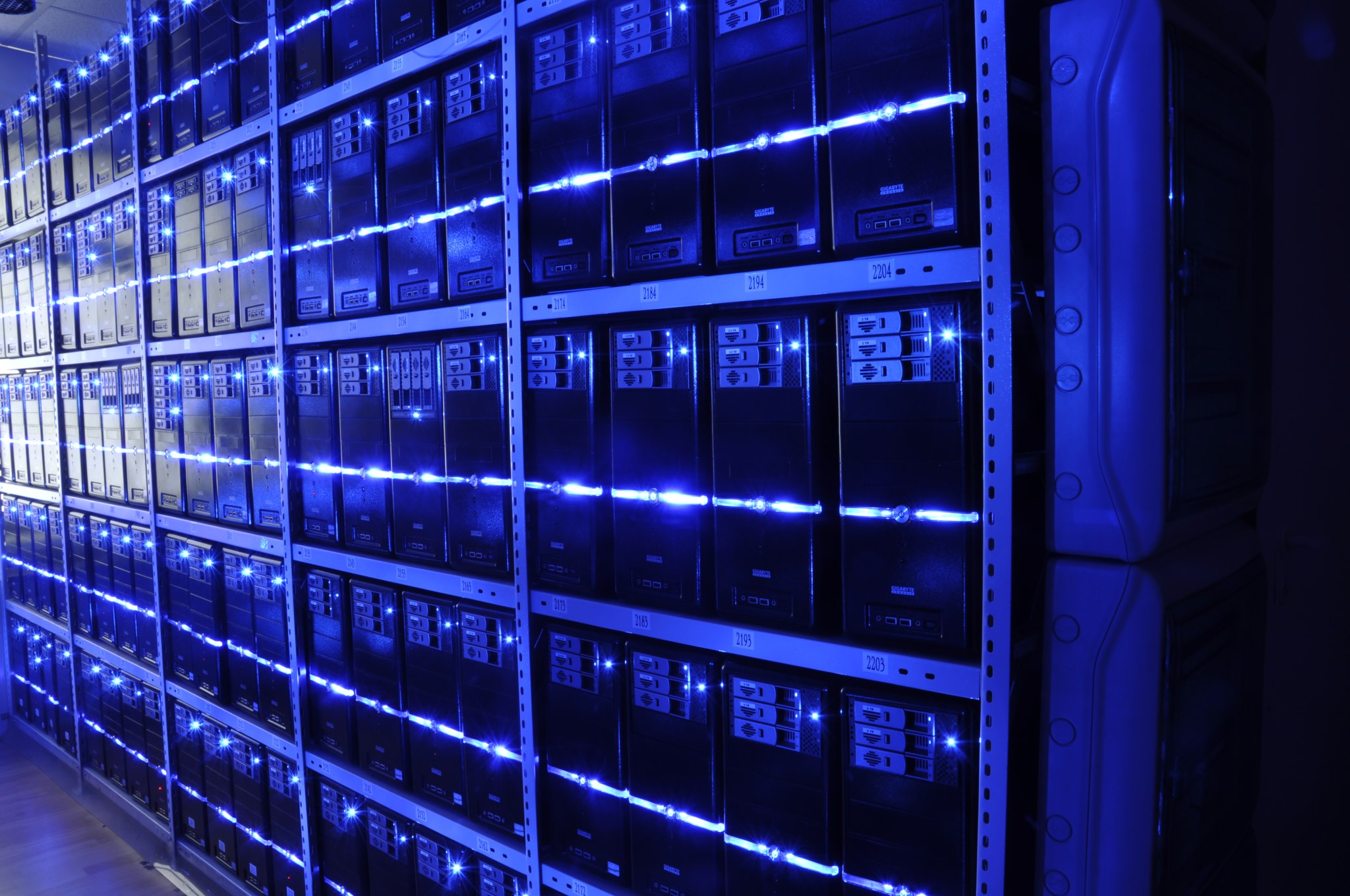 Server racks inside a data center, representing AI compute infrastructure financed under Nvidia 500 billion plan