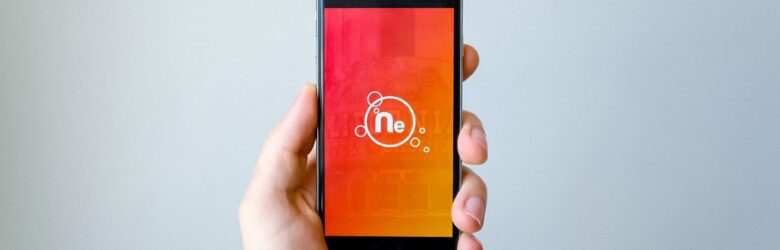 A smartphone being held, representing mobile messaging and communication verification