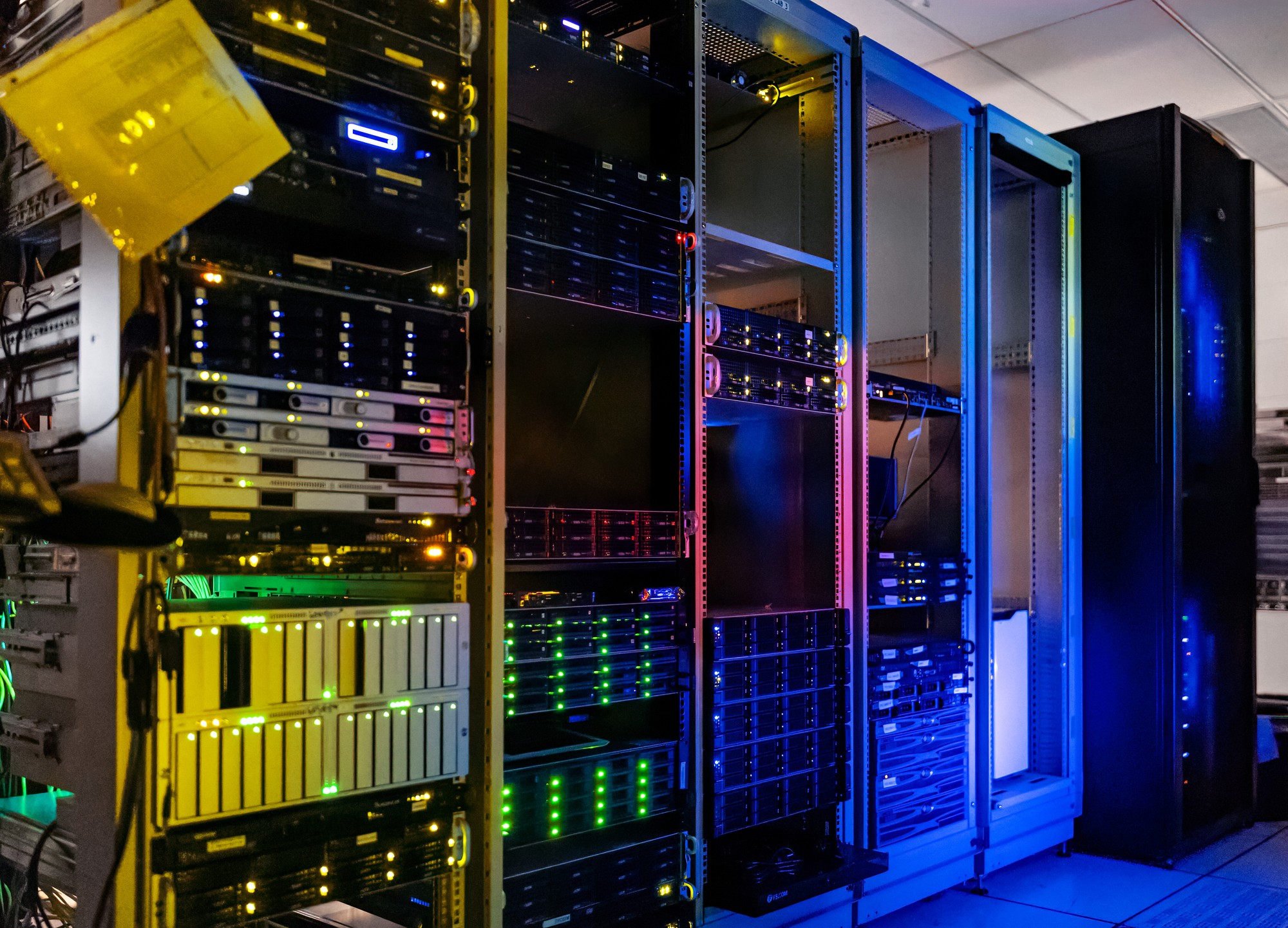 Inside a data-center server room packed with rack-mounted servers and cabling