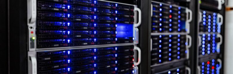 Rows of NOIRLab data center server racks representing AI control and monitoring infrastructure