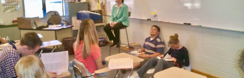 Students and a teacher in a classroom, illustrating NYC's public school AI policy