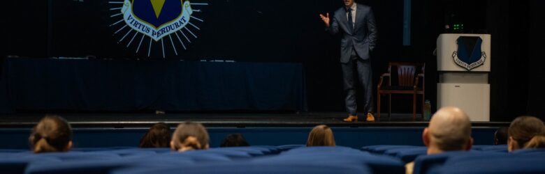 People attending an in-person internet safety education session