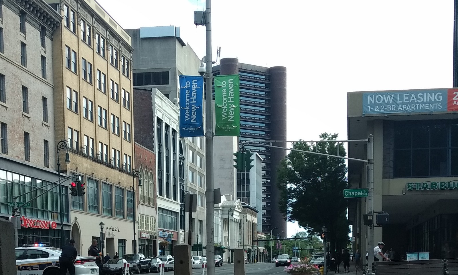 A person in a public space with the text Surveillance Under Surveillance overlaid, by Yale Privacy Lab