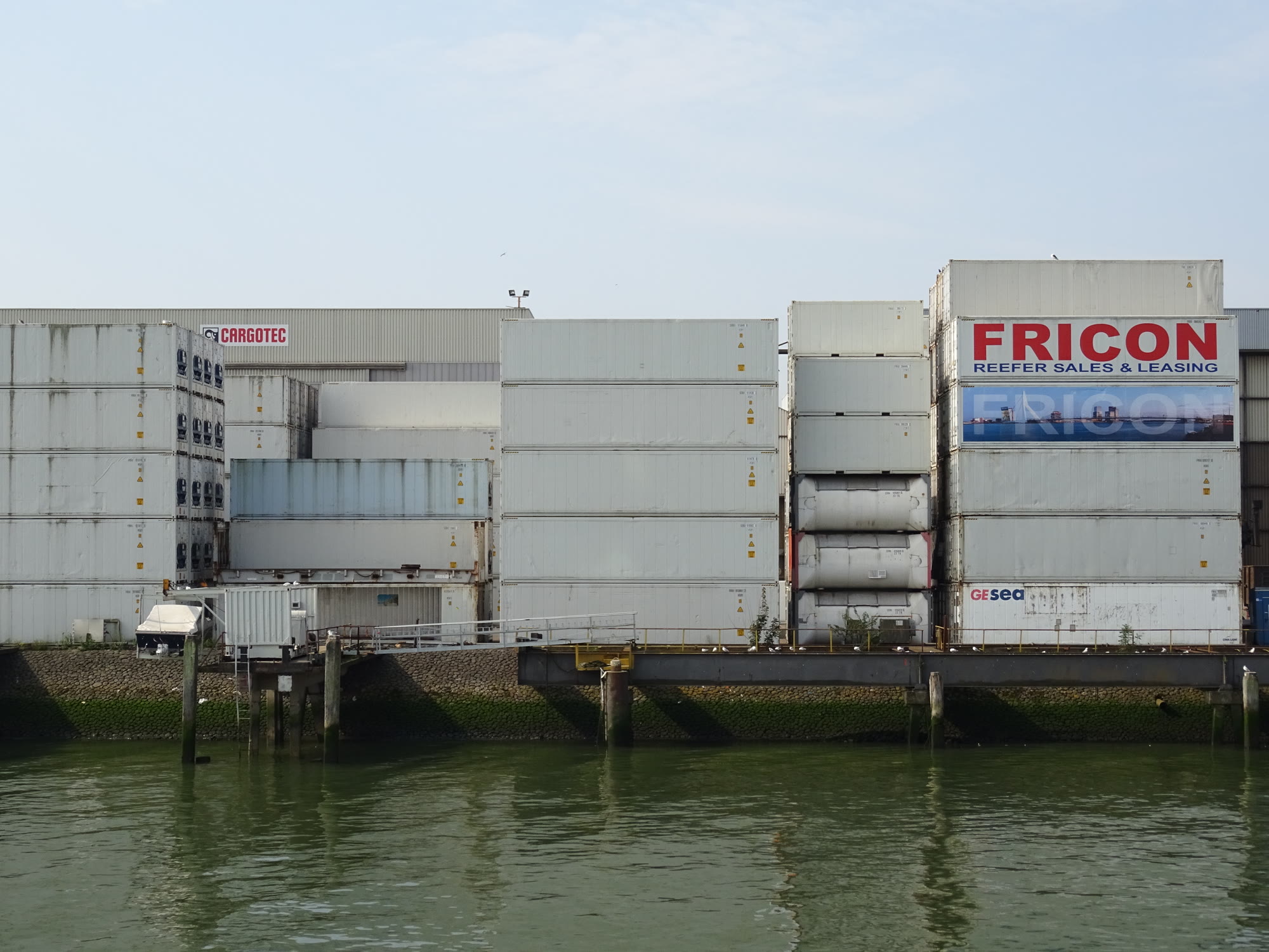 Shipping container stacks at a commercial port terminal