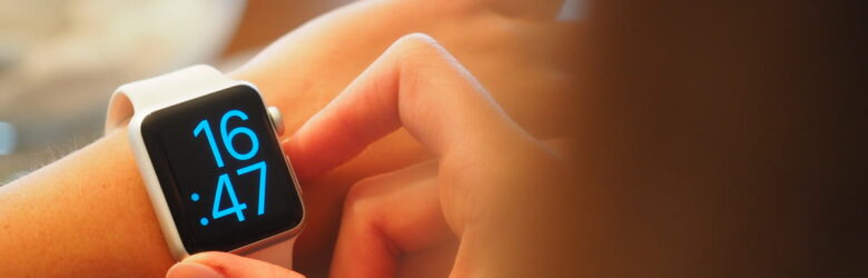 Smartwatch on a person's wrist displaying health metrics